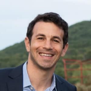 Smiling Man In Outdoor Setting