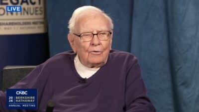 Warren Buffett speaking at the 2026 Berkshire Hathaway Annual Meeting with CNBC anchor Becky Quick