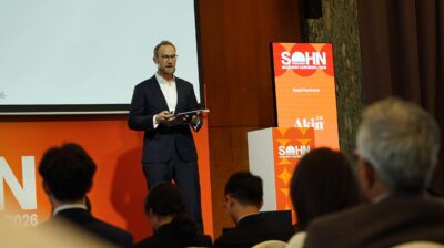 Andrew Limond presenting NICE Information Service investment thesis at Sohn Hong Kong 2026